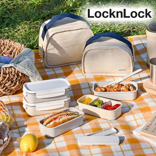 LocknLock lunchbox set and cotton bags displayed on a picnic blanket