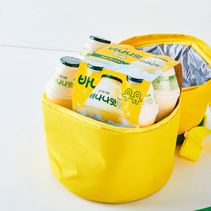 Insulated yellow Binggrae Banana Milk cooler bag with spacious compartment holding Banana Milk bottles, open to show insulated lining