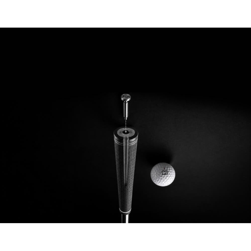 OPT Golf Balance Pin Swing Trainer weight positioned above a golf club grip with golf ball