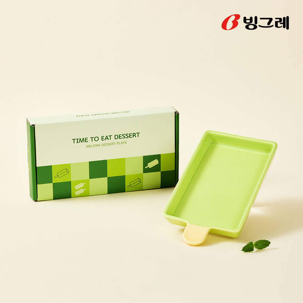 Binggrae Melona green popsicle-shaped ceramic plate beside box